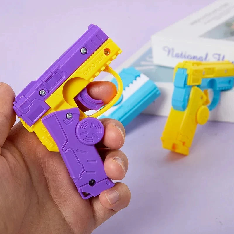Fidget Spinner 2-en-1 Pistolet Gyroscope Enfant – Rebond Automatique | 2-in-1 Deformed Spinner Gun Toy